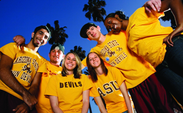 Students in a circle wearing ASU gold shirts